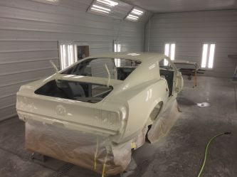 Body of the Boss 429 gets paint. correct overspray is also applied.