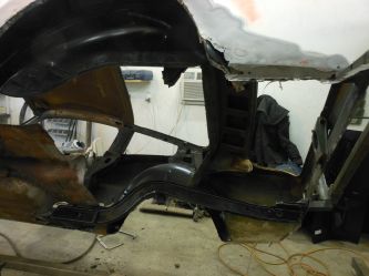 Complete rear frame repair. A car needing this much is done in stages so we don't loose the integrity of the entire body.