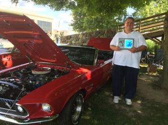 The convertible wins another trophy for the best convertible class at the Gilmore Museum Red Barn Spectacular. Over 800 top quality cars were there. Owner is very happy.  