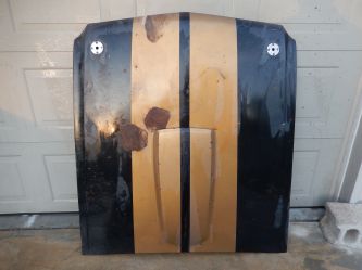 Very rare original '66 steel hood and scoop. Original paint. We will document the stripe dimensions and color of the gold stripe before removing the paint.
