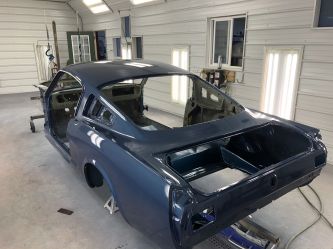 A fresh coat of the original Caspian Blue for this Mustang restoration.